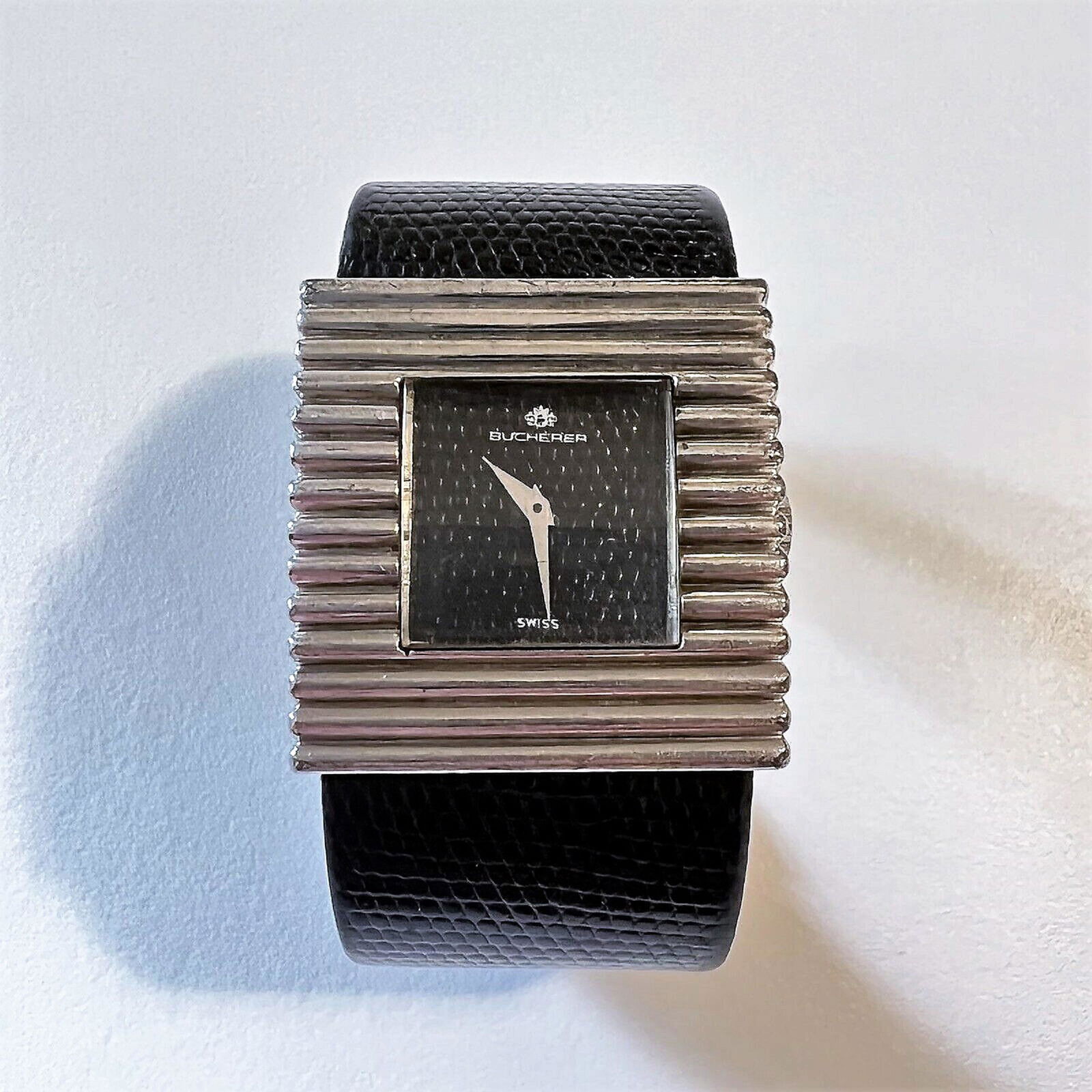 CHOPARD / BUCHERER SILVER CUFF WATCH: BUCHERER BY CHOPARD STERLING SILVER CUFF WATCH, AS SHOWN....this watch was made by CHOPARD and sold by BUCHERER.... it is signed BUCHERER on the dial and case and CHOPARD on the movement and case...th