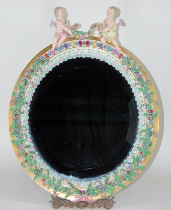 A LARGE 19TH CENTURY MEISSEN MIRROR: A large first quality Meissen mirror, cross swords mark. 22" h x 17" w Estimate $2000-3000