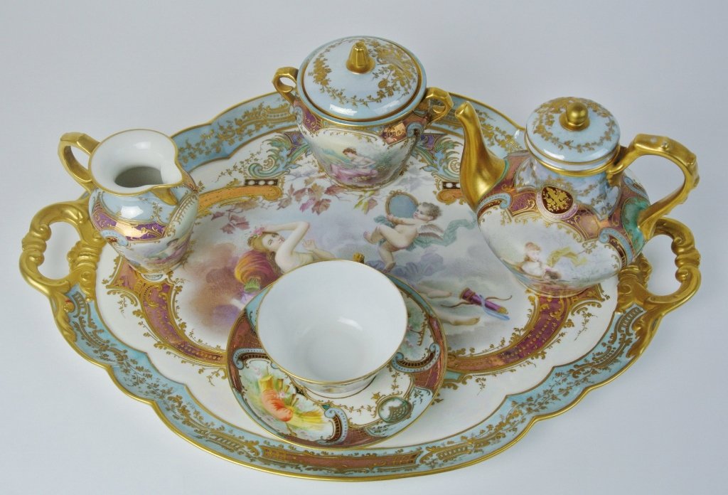 IMPOSING ART NOUVEAU SEVRES TEA SET: An imposing Art nouveau Sevres tea set, comprising, of a tea pot, sugar bowl,milk, cup and saucer, and a tray, measuring 18" wide. Estimate $4.000-5.000