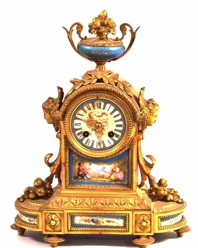 19TH CENTURY GILT BRONZE AND SEVRES PORCELAIN CLOCK: A 19th century ormolu and Sevres porcelain clock , measures 14.5" h, 11.5" wide , perfect condition.Estimate $1.000-1.500