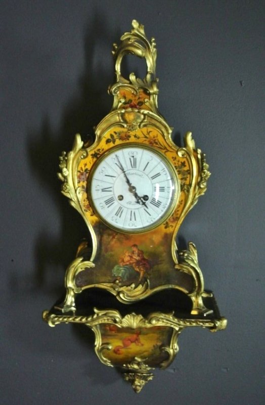 19TH CENTURY VERNIS MARTIN WALL CLOCK: A 19th century Vernis Martin ormolu mounted wall clock, with base, measures 26" high .Estimate $1.500-2.000