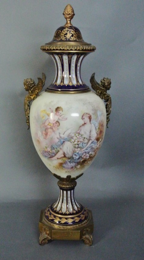 19TH CENTURY ORMOLU MOUNTED SEVRES VASE: 19th century dore bronze mounted SEVRES vase and cover. 29,5" high , perfect condition .Estimate $1800-2000