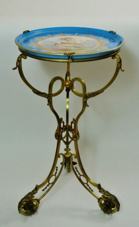 SEVRES STYLE PORCELAIN AND GILT BRONZE TABLE: A 19th century Sevres style porcelain and gilt bronze table , measures 32.5" h, 18" diameter .Estimate $2.500-3.000