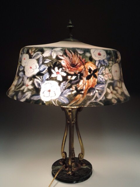 PAIRPOINT LAMP: Bird of Paradise” Table lamp. Shade & Base signed.Early 1900’s. Minor flake on edge! The shade measures 17 3/4 at its widest and 21 inches tall. The shade is alone 8 inches high. Estimate $2.000-2