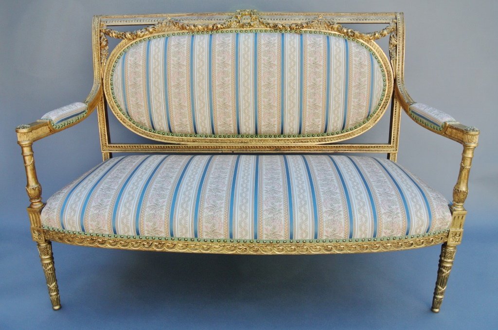 19TH CENTURY GILT WOOD LOVESEAT: A very fine 19th century carved and gilt wood loveseat , silk cover .Estimate $800-1.000