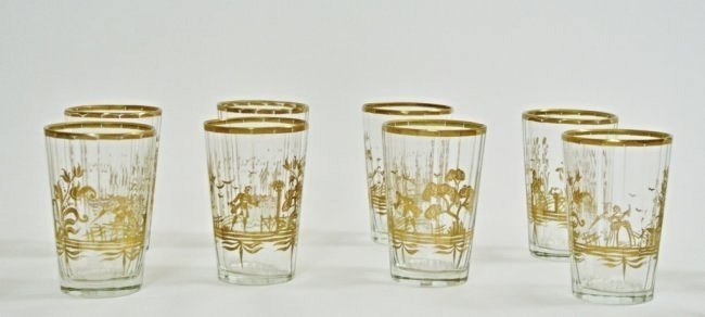 SET OF 12 BACCARAT SHOT GLASSES: A set of 12 gild decorated Baccarat glasses , measuring 3" tall , all in perfect condition .Estimate $300-400
