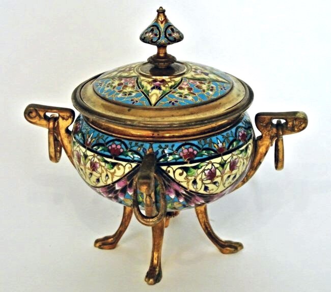 19TH CENTURY BRONZE & CHAMPLEVE ENAMEL URN: A French 19th century bronze and champleve enamel urn and cover, 6.5" h., in excellent condition.Estimate $600-700