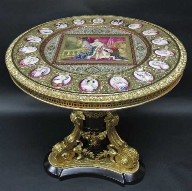 SEVRES STYLE ORMOLU MOUNTED TABLE: Hand painted portrait plaques with glass top. Measures 30" tall x 31 1/2" diameter. Good condition. Estimate $6.000 - $8,000