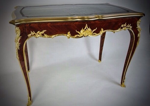 A FRENCH ORMOLU MOUNTED KINGWOOD DESK F. LINKE: A 19th century ormolu mounted Kingwood desk , by F. Linke , unsigned. Measures 46" length , 29" wide , 32" high . In excellent condition. Estimate $8.000-10.000