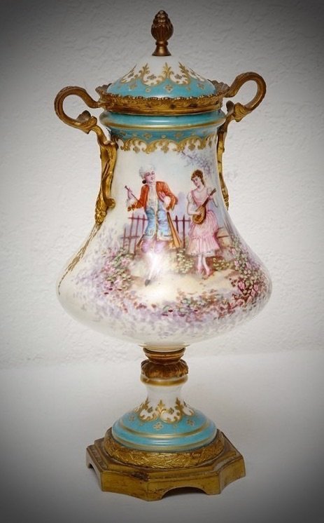 SEVRES GILT BRONZE MOUNTED VASE: A Sevres porcelain ormolu mounted vase, circa 1900, measures 10.5" high , in perfect condition. Estimate $600-800