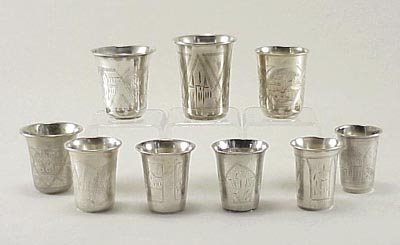 Nine Various Russian Antique Silver Beakers: Nine Russian 19th Century beakers all have etched scenes of villages. They are all marked .84 with other makers marks and some are dated in the late 19th Century. All in good condition, a few very lig