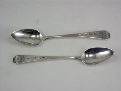 Pair 18thC. Coin Silver Coffin End Silver Spoon s: Early American coin silver coffin end teaspoons have a period script monogram within a shield form at the top "EC". Makers mark of "RW" within an oval, possibly for Robert Wilson, New York, 1816. Tota