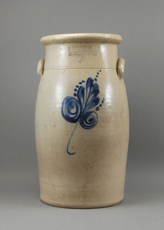 American 19C Norton Decorate Stoneware Butter Churn: American 19C Norton Blue Stoneware Butter Churn. The E. Norton & Co., Bennington, Vermont butter churn has a blue wash leaf design along the front and is embossed with the # 3. The lot comes with a pe