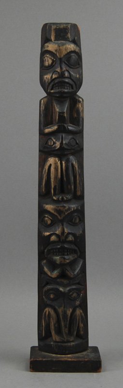 Northwest Coast 1920 American Indian 15" Totem Pole: Northwest Coast Carved Native American Indian Totem. The four totemic figures has a dark patina with surface wear. Likely dates from the first half of the 20th century. In good condition. Measures 15 