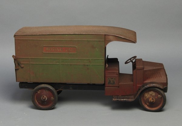 Steelcraft Pressed Steel Mack Toy Moving Van 24": Steelcraft Pressed Steel Mack Toy Moving Van. The 1930s toy truck has allover haze of rust, but the truck has all components and is in good working order - ready to restore. Measures 13 1/2" high and 