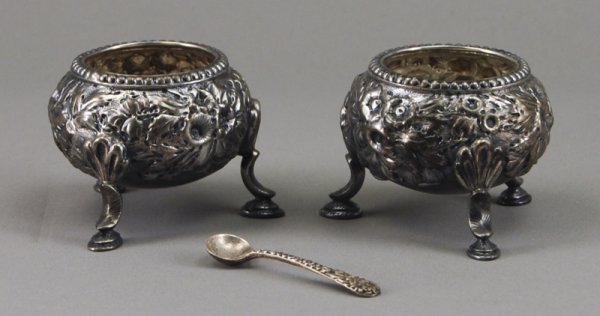 Pair of S. Kirk - Sterling Silver Repousse Salts: Pair of S. Kirk and Sons Sterling Repousse Footed Salts. The sterling footed salts are faintly marked on the bottom "S. Kirk and Sons" with period monogram "S" and are raised on three hoof feet. Inclu