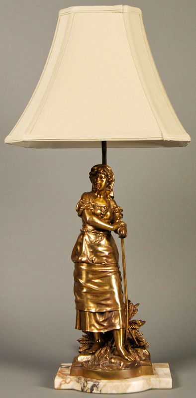 Eutrope Bouret (French 1833-1906) Bronze Lamp: Eutrope Bouret (French 1833-1906) Gilt bronze French 19C, signed Bouret figure of a standing woman with a rake on a shaped base. The bronze sculpture is mounted on a shaped marble stand. In good condi
