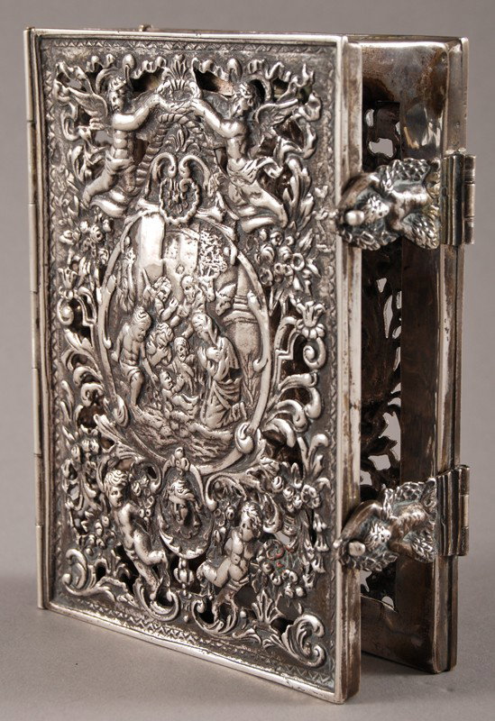 Hallmarked Repousse Dutch Silver Bible Cover: Decorated with a repousse scene of Christ in the manger and ascending to heaven. hallmarked Netherlands .833 coin silver 11.4 oz . Engraved inscription to Sherman L. Whipple on Easter 1911 who was a p