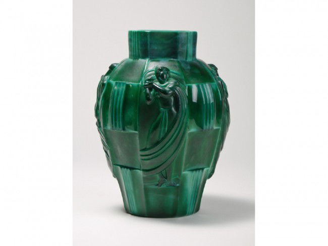Malachite Glass Schlevogt Draped Nude Ingrid Vase: Malachite Art Glass- Schlevogt Ingrid Draped Nude Vase - the Ingrid Malachite glass vase has panels of draped nude figures of Ingrid. In good condition. Measures 9 ½" high x 6 ½" in diameter.
