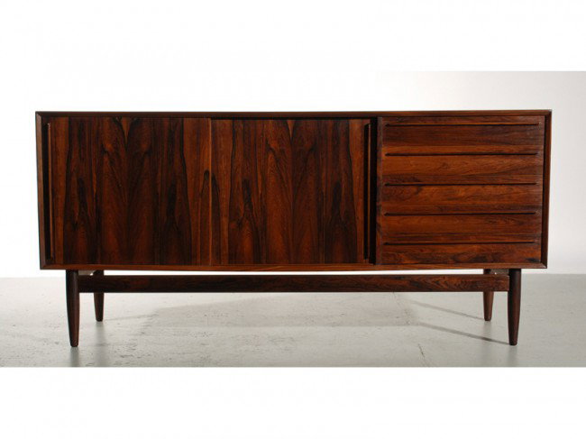 Hansen MidCentury Danish Modern Rosewood Credenza: A fine Brazilian Rosewood Credenza by maker H. P. Hansen. Signed with makers marks, and applied tag. 2 sliding doors which conceal storage and adjustable shelves. 4 drawers on the right. Cabinet has a