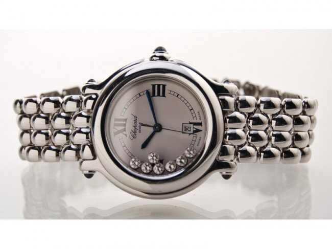 Chopard Diamond Stainless Happy Sport Wristwatch: Chopard "Happy Sport" diamond and stainless steel ladies wristwatch. The guaranteed to be authentic watch is running at this time. The dial, band and crystal are in good condition. The watch is marked