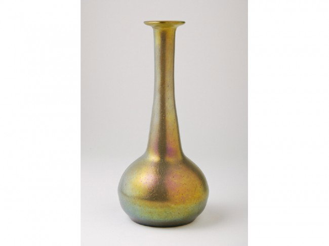 Loetz Silberi Austiran Art Glass 8" Bud Vase: Tall unsigned Loetz Silberi iridescent bud vase has a rich green to gold iridescence with a round body and slender neck with flaring top. It is in good condition and measures 8 ½" high x 3 ¾" in dia
