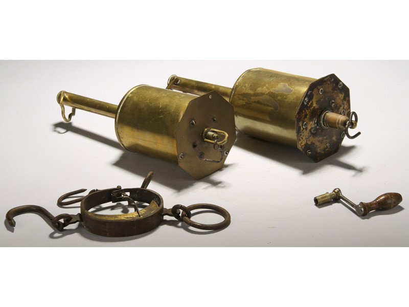 Two 19C English Brass Clock Jacks Key Hook & Scale: Two Brass English 19th Century Antique Clock Jacks. One marked Topham, London on the keyhole cover. The other is signed Salters. Both are over wound but each include a key and a hook with a scale on i