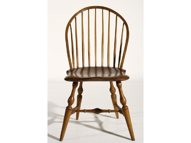 Windsor Bow Back 19th C. Nine Spindle Side Chair: Original 19th Century Windsor Bow Back Side Chair. The Windsor chair is made of mixed woods with a maple base with boldly turned legs and stretcher. Has a nine spindle back with a shaped saddle seat. 