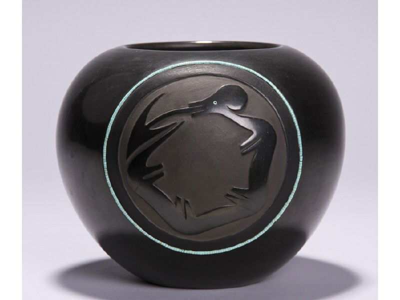 Dora Tse Pe - San Ildefonso Blackware Pottery Jar: Dora Tse Pe San Ildefonso Native American Indian Blackware Jar with Inlaid Turquoise. The jar is of a smooth form with a round medallion with a lizard curled in the center and is surrounded with cylin