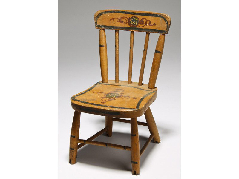 Old Paint Decorated Miniature Windsor Doll Chair: Paint Decorated Windsor Rod Back Doll Chair. The doll - miniature Windsor style chair has paint decoration with star. Cut out rocker slots on bottom which would convey that there were once rockers on 