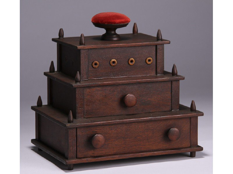 Shaker Walnut 19C 3-Tiered Drawered Sewing Box: Shaker 3-Tiered Drawered Sewing Box. The shaker sewing box has a lift top lid with a round velvet covered pin cushion. Retains original bone thread dispensers. The box appears to be made out of chestn