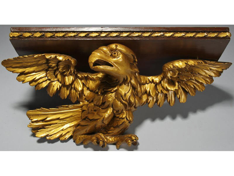 Antique Mid 19C Carved Gilt Eagle Clock Shelf: Mid 19th Century Carved and Gilt Eagle Clock Shelf. The carved Federal style eagle clock shelf has a rectangular wooden shelf with gilt leaves which surround the shelf with three modern brass hooks on