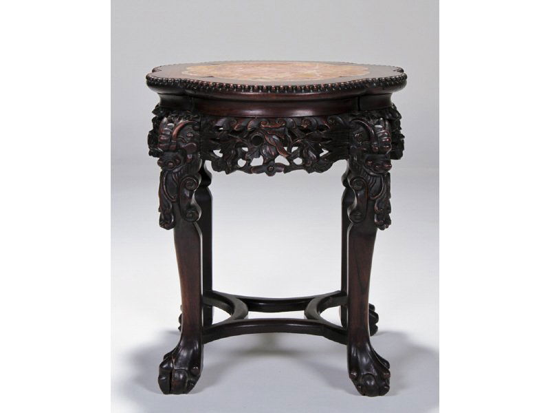Chinese Carved Rosewood Marble Table Stand, Stool: Chinese Rosewood Marble Top Carved Low Table or Stool. The Chinese rosewood table has a fruit carved apron with stylized dragon heads, knees ending in ball, and claw feet. There are a few small chips