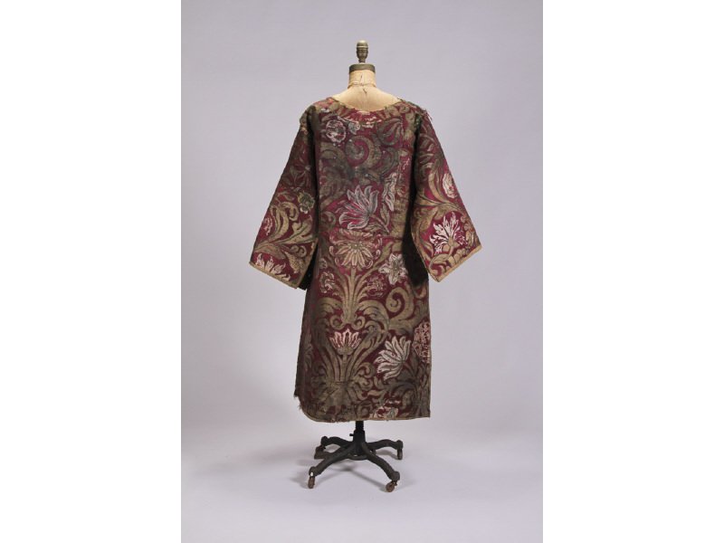 Brocade 18C Dalmatic Ecclesiastical Vestment Textile: Brocade 18th or early 19th Century Dalmatic Ecclesiastical Vestment. The linen fabric lining appears to be hand-woven. The heavy brocade fabric has some small breaks and staining typical and is expect
