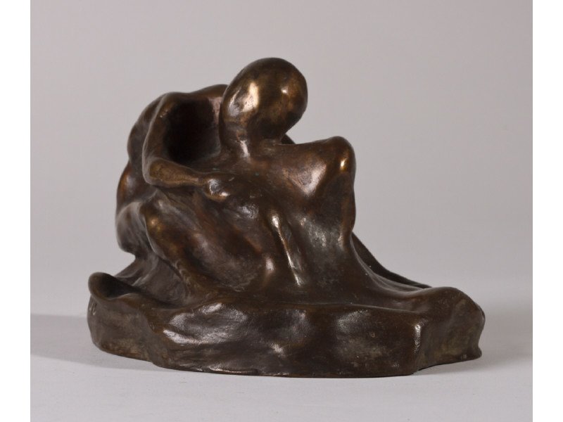 NORMAN J. OSHERMAN (American, 20th C) Bronze: NORMAN J. OSHERMAN (American, 20th Century) "Girl on Rock". Bronze sculpture. Signed NJO. In good condition. Measures 4" high, 6 ½" long and 5 ¼" wide.