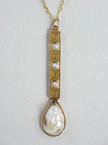 ART NOUVEAU Pearl 14K Gold Lavaliere: ART DECO Pearl 14 Karat Gold Lavaliere. This lavaliere necklace has an unusual Deco design of incised maze with alternating seed pearls in open cut-out and ends with a large natural seed pearl at the