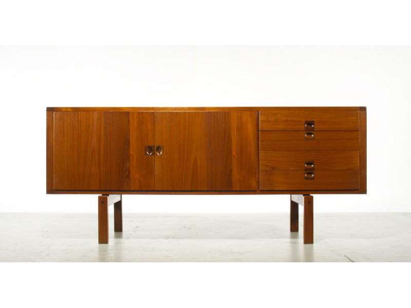 Teak Sweden Credenza with Rosewood pulls Swedish: Teak Swedish Credenza with Drawers. Doors on left and adjustable shelves. Unique Rosewood pulls. Fully finished Teak back. Marked on underside of cabinet Sweden. Good condition. Measures 27.5"H x 64"W