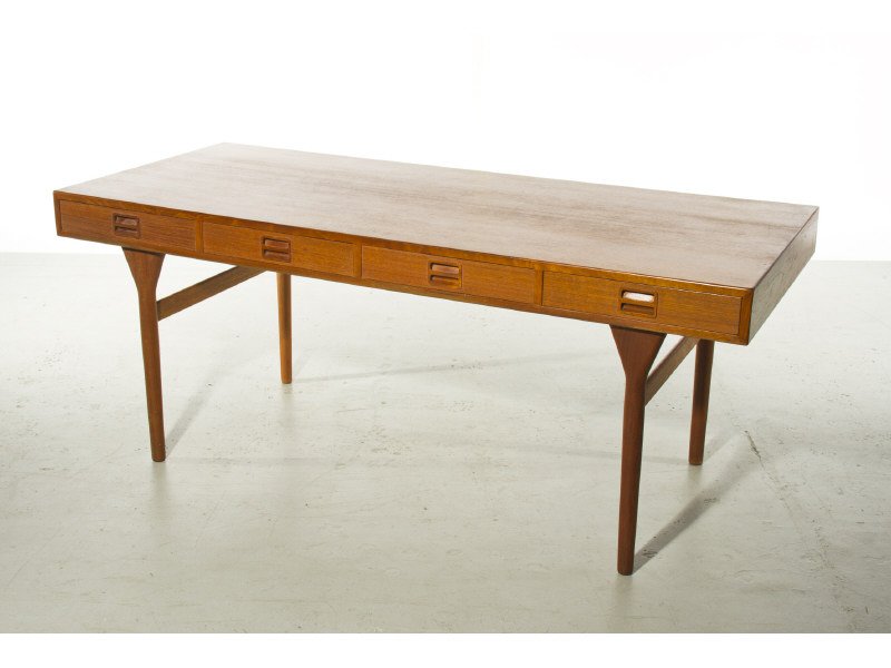 Danish Mid Century Modern Teak Desk by Nanna Ditzel: Nanna Ditzel Teak Desk c.1960. 4 Drawers with sculpted pulls. Finished on all sides. Good condition. Measures 28.5"H x 69"W x 29.5"D
