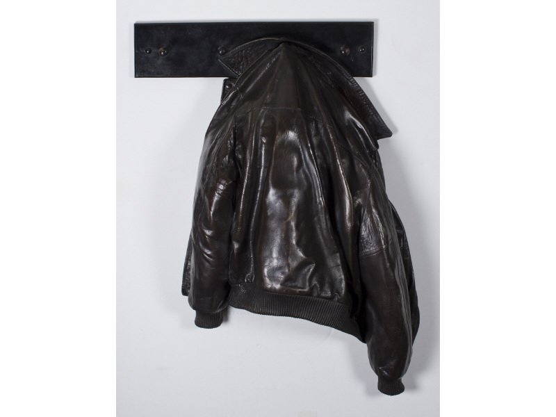 S. Hanson Leather Bomber Jacket Bronze Sculpture: Scott Hanson (American 20C) "Glory Days" 52/99 Bronze Coat Rack Sculpture. The realist sculpture of a bronze bomber or motorcycle jacket hanging on a coat rack is realistically sculpted and cast with