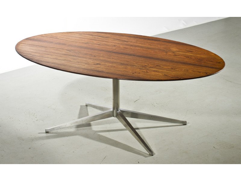 Knoll Mid Century Modern Rosewood Oval Table Desk: Florence Knoll designed Brazilian Rosewood Oval Dining Table on Steel Base. Good condition. Some wear to chrome base from normal use. Measures 28"D x 48.25"W x 78.25"L Was used as an executive desk by