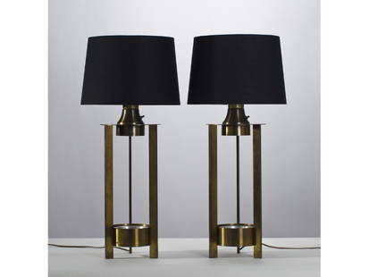 Pair of Mid Century Modern Brass 3 Leg Table Lamps: Pair of Mid century Modern Brass Table Lamps. c.1955. In the style of Benjamin Baldwin. Heavy Three-Legged brass and aluminum construction. Milk glass diffusers. The spun aluminum inserts on the lamp