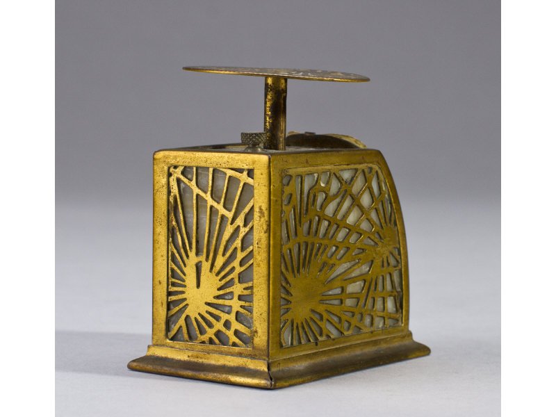 Tiffany Studios NY Bronze Pinecone Postal Scale: Tiffany Studios NY Bronze Pinecone Postal Scale. Pinecone pattern on three sides, original celluloid indicator label on front has wear. Signed on underside 'TIFFANY STUDIOS NEW YORK 872. The iridescen