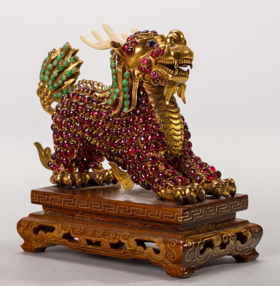Chinese Semi-Precious Jewel Gold - Qilin - Kylin Lion: Chinese Semi-Precious Stone Jeweled Gold Plated Kylin. Set with genuine semi-precious jeweled cabochon stones accented with green gemstones on the tail and hair. There is one green stone missing. Has