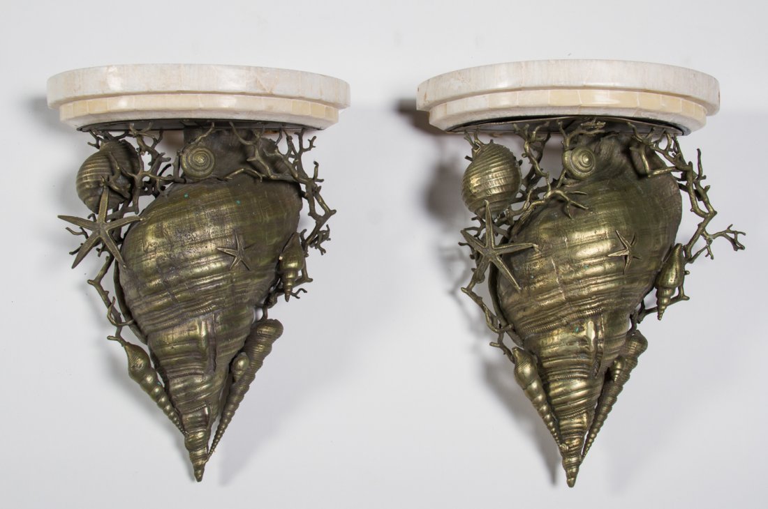 Pair of Bronze Seashell and Marble 16" Wall Shelves: Pair of Patinated Bronze Seashell and Marble Wall Shelves. High quality fine 20th century decorative bronze wall shelves are quite heavy and have a light green patina. The pieced marble curved shelves