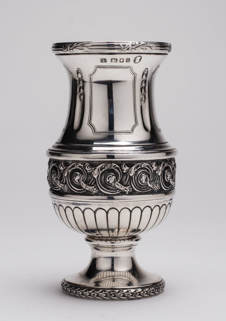 English London Edwardian Repousse Sterling Silver Vase: English London Edwardian Repousse Sterling Silver Vase. The finely chased and decorated vase is hallmarked for London 1935, with makers mark Daniel & John Welby. Weighs 7.5 oz and measures 6 inches hi