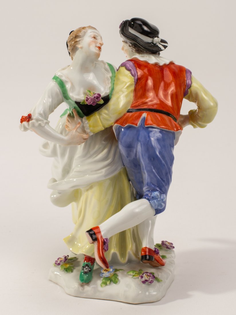 Meissen 19C German Porcelain Figure of a Dancing Couple: Meissen German Porcelain Figure of a Dancing Couple. Under glaze blue crossed swords mark on the underside as well as an incised 917 and 140. In good condition. Measures 6 inches in height.
