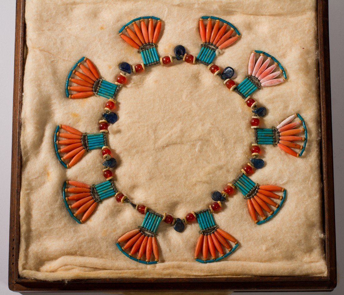 Ancient Egyptian Coral Hardstone & Fan Bead Necklace: Antique Egyptian Coral and Hardstone Fan Necklace. The necklace was created from various beads discovered in different regions of Egypt that date from 1850 B.C to 1200 A.D. The unusually rare necklace