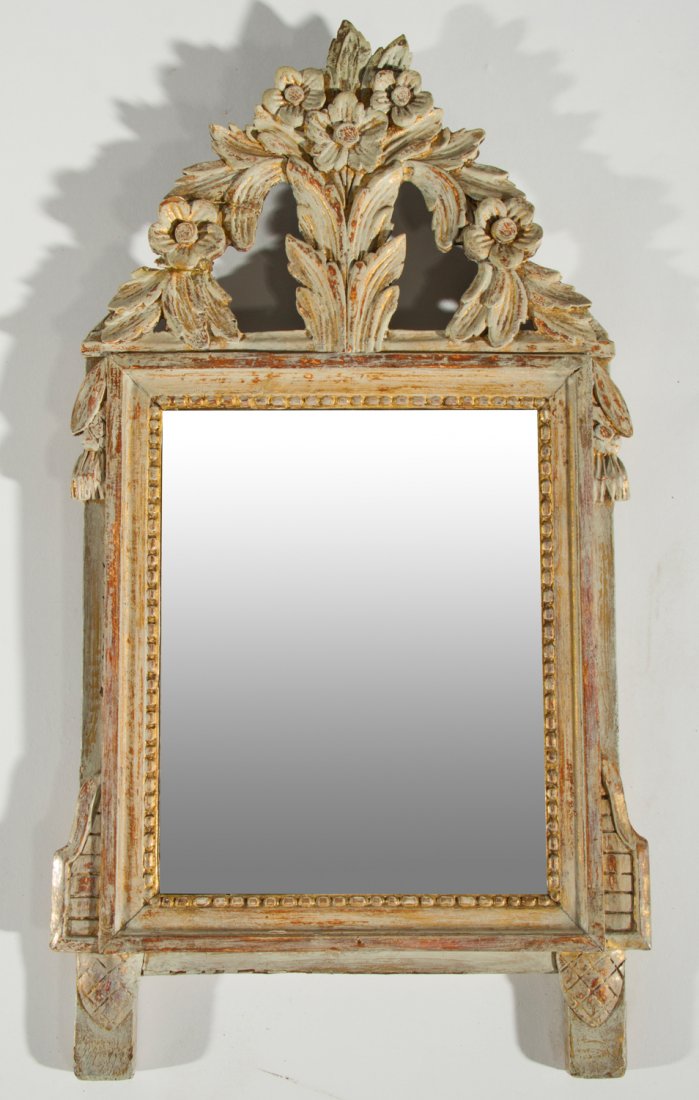 French Louis XIV Carved Provincial 26" Antique Mirror: French Louis XIV Carved Provincial Antique Mirror The mirror has a white washed finish with old glued repairs and a missing leaf carving at the top. Hand planed back wood has a deeply incised "Made in