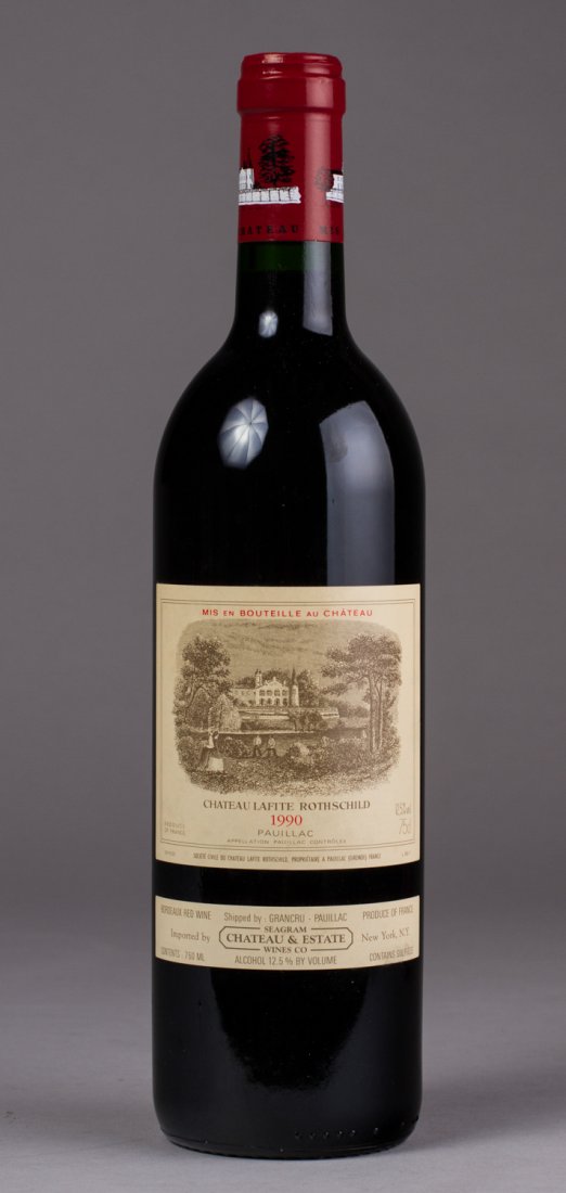 Chateau Lafite Rothschild 1990 - French Bordeaux Wine: Chateau Lafite - Rothschild 1990 French Red Wine. Chateau Lafite Rothschild 1990 Pauillac France Wine. French Red Bordeaux blend from Pauillac, Bordeaux, France. Neck level fill. The bottle and label 