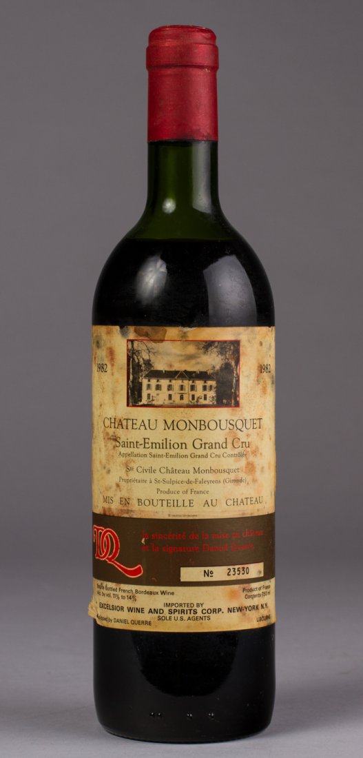 Chateau Monbousquet Saint-Emilion Grand Cru 1982 Wine: Chateau Monbousquet Saint-Emilion Grand Cru 1982. Bordeaux Medium Red. High shoulder fill. The bottle and label are in good condition, aside from some small tears and some browning. The wine has been 